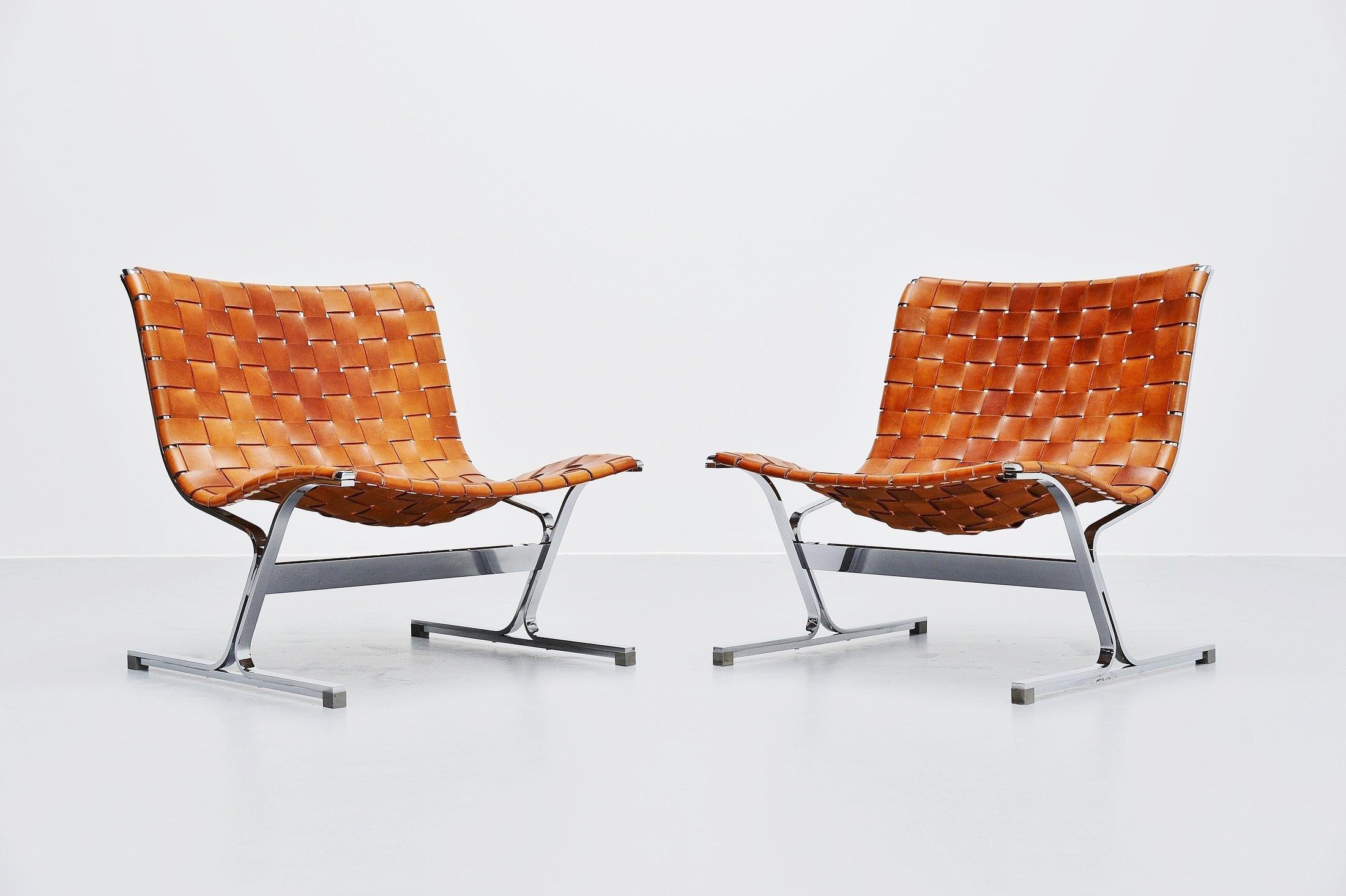 Very nice pair of cognac Luar lounge chairs designed by Ross Littel and manufactured by ICF De Padova, Italy 1965. These amazing lounge chairs are made of chrome-plated solid metal frames with amazing patinated cognac leather straps that are still