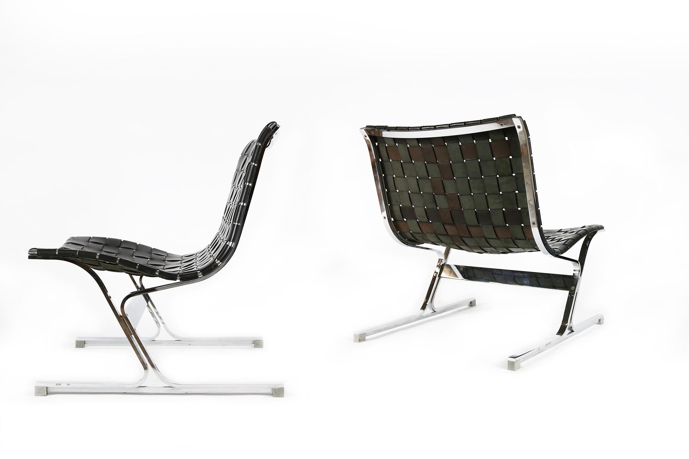 Very nice pair of Luar lounge chairs designed by Ross Littel and manufactured by ICF De Padova, Italy 1965. These amazing lounge chairs are made of chrome-plated solid metal frames with black leather straps that are still original and have a nice