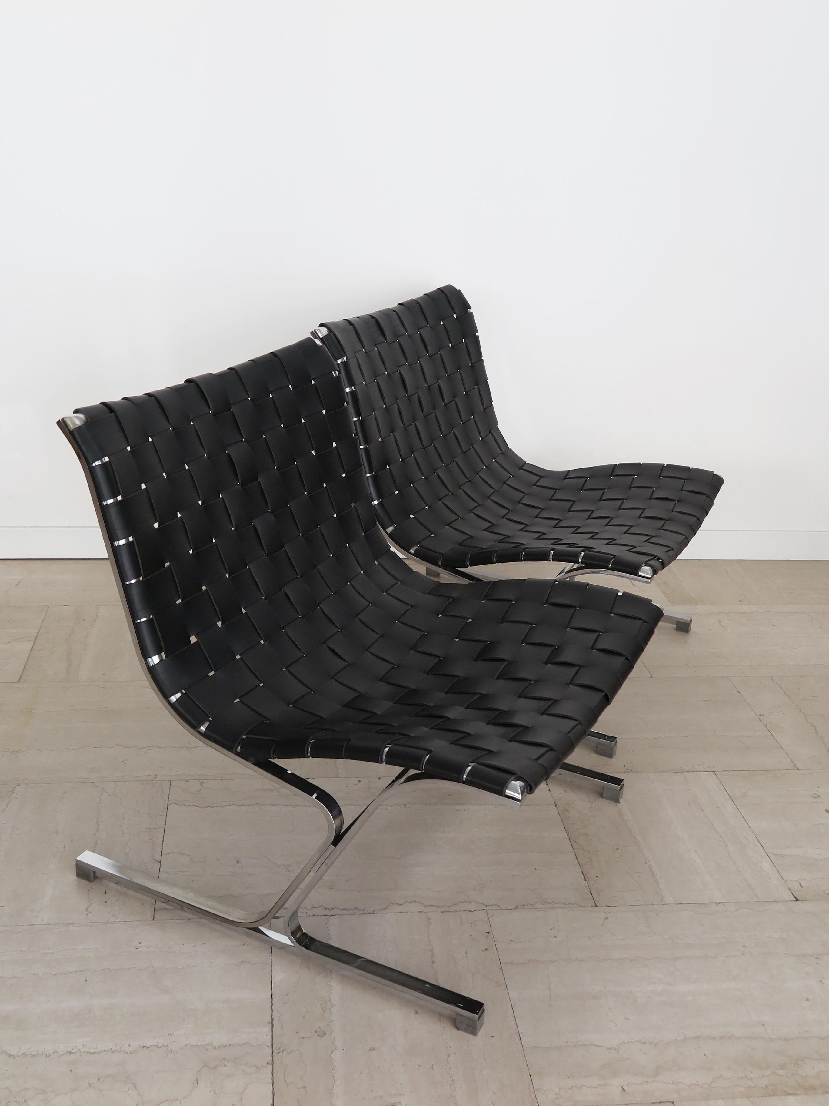 Italian midcentury modern design chiar armchairs Luar model, set of two, designed by Ross Littell in 1965 and produced by ICF 
with drawn steel frame in rectangular section with chrome finish, seat and back in woven leather, Italy in the 1960s.