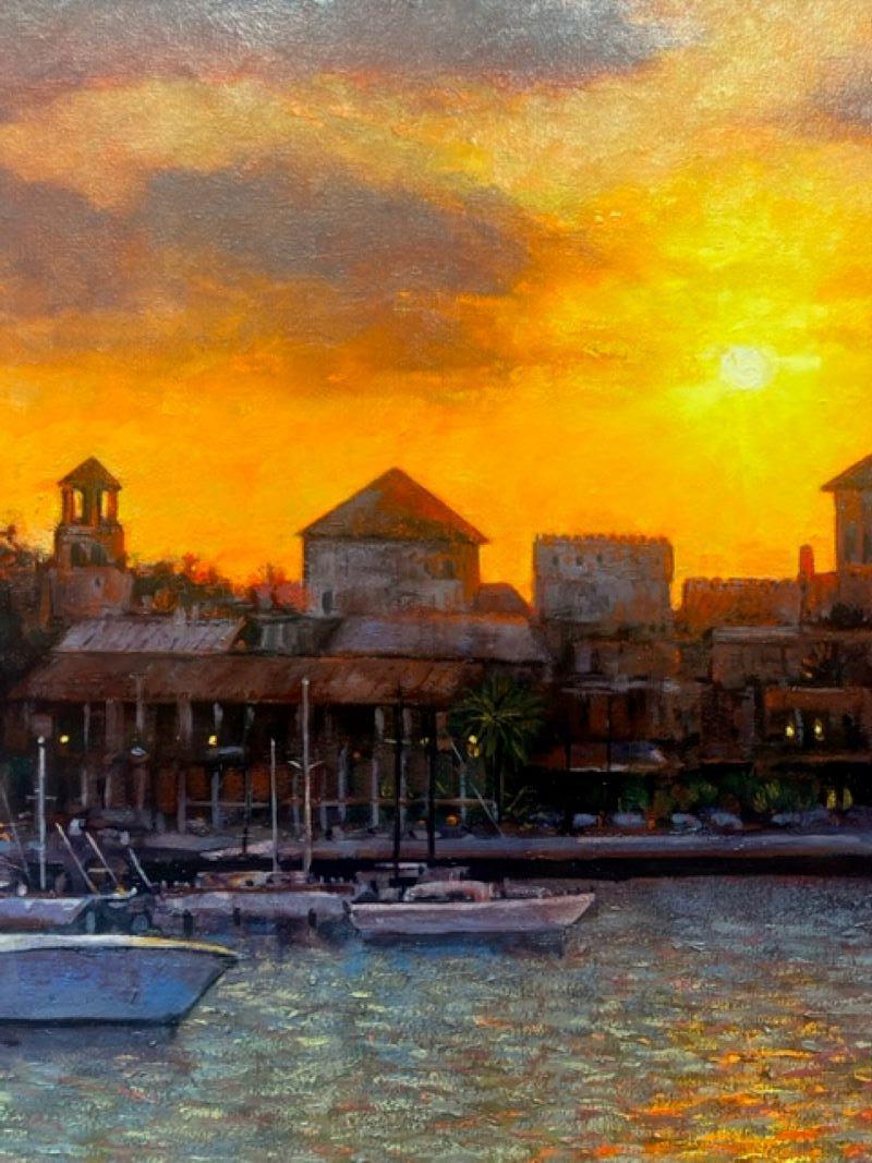 Myers creates an atmospheric scene from the perspective of the inlet looking towards Marine Street, St. Augustine.  The burning sunset sky reflects onto the historic skyline casting a purple and reddish tinge on the landscape.  The movement of the
