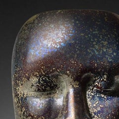 "Of Earth and Sky" - hand-blown glass sculpture of a human face