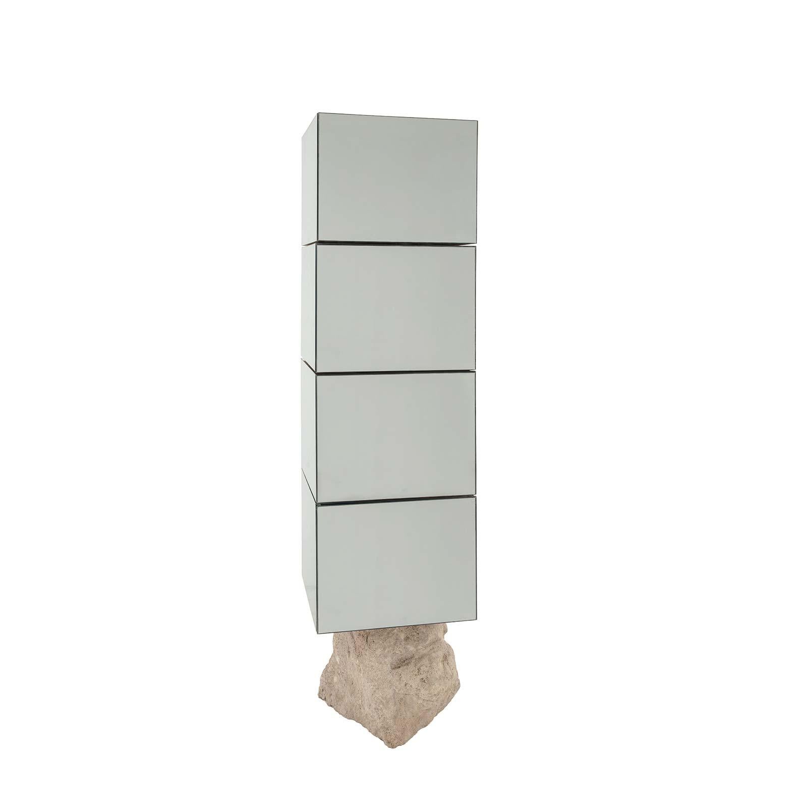 Designed by Francesco Maria Messina

Turnable bookshelf made of silver mirrored acrylic and aluminum lining and supported by a natural coral stone. Internal part in a genuine turquoise Italian leather.

Limited edition of 9 pieces.