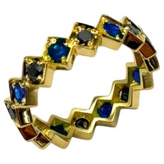 Rossella Ugolini 18 Karat Gelbgold Bandring mit 0,60 Karat Saphir und schwarzen Diamanten