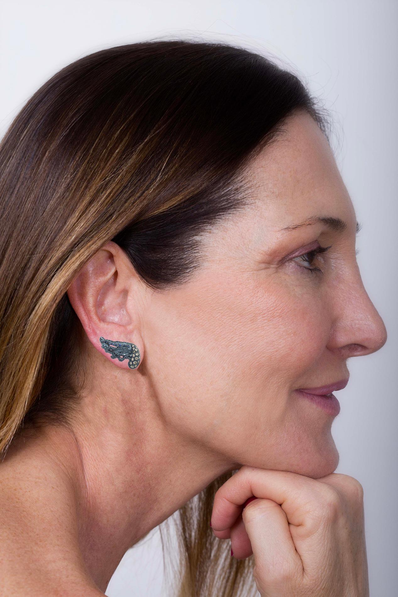 Rossella Ugolini 18K Gold Black Rhodium 0.30 carats brown diamonds, blue sapphires Feather Stud Earrings, meticulously handcrafted in Rome, Italy, Dimension: 1,18 inches (3 cm ) in length. Each feather is carefully carved in 18K Gold to resemble the