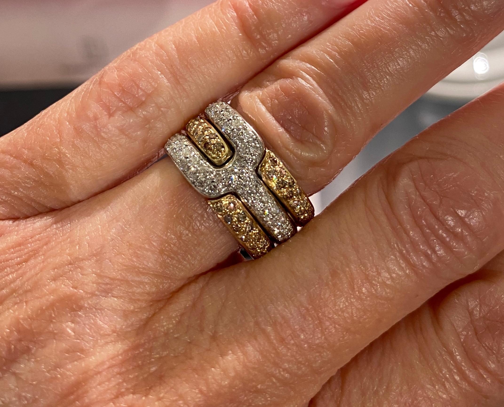 Rossella Ugolini 18k Yellow Gold 0.50 White Diamonds  0.55 Brown Diamonds Band Ring. This exquisite piece combines 0.50 carats of white diamonds and 0.55 carats of brown diamonds, seamlessly integrated into a unique, bicolored design. The ring is a
