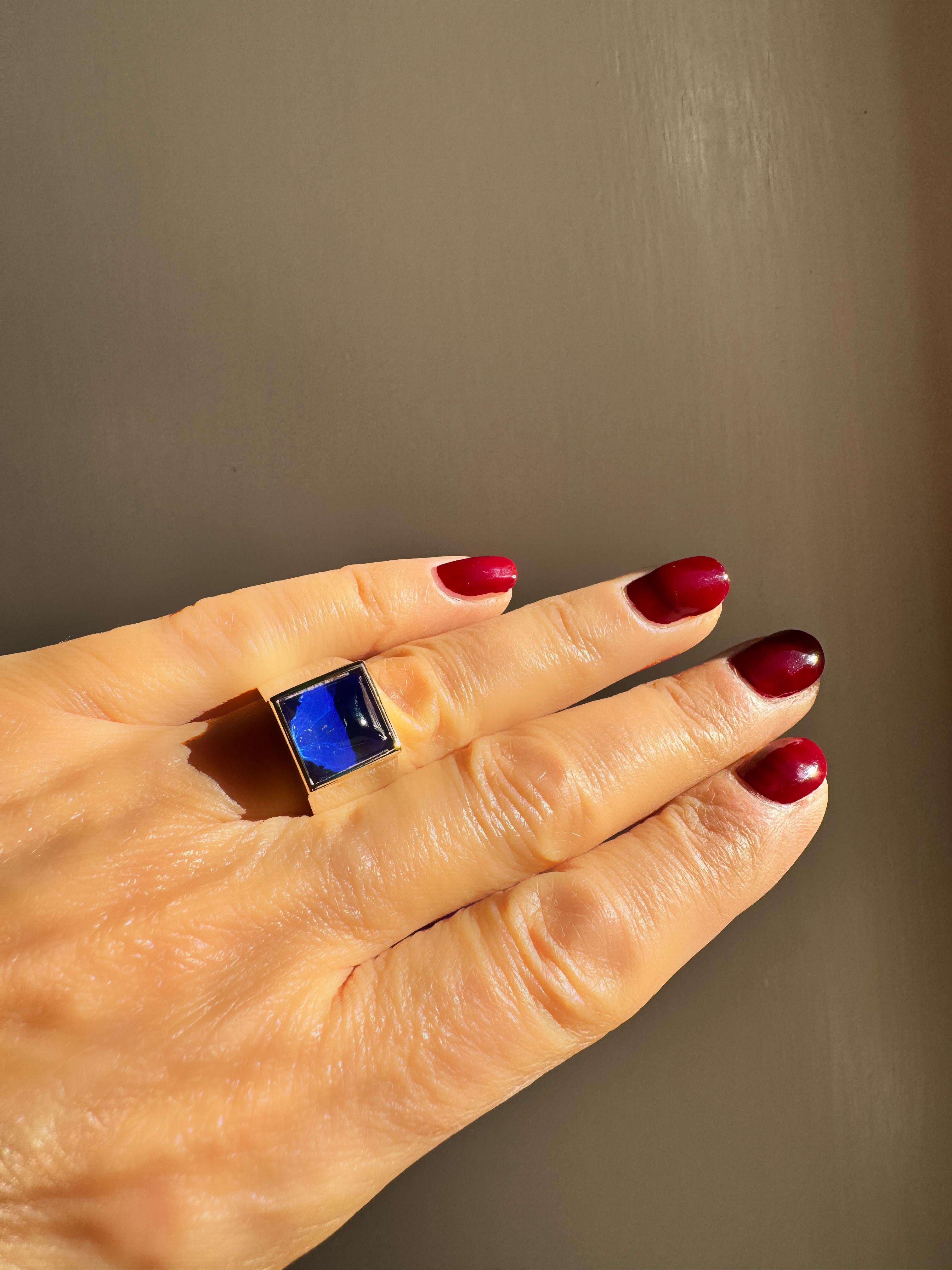 Rossella Ugolini's Castle of Italy design collection, meticulously handcrafted in Platinum featuring a striking lapis lazuli and rock crystal sugarloaf cabochon set on a 18K yellow gold bezel . This exceptional craftsmanship, originating from Italy,