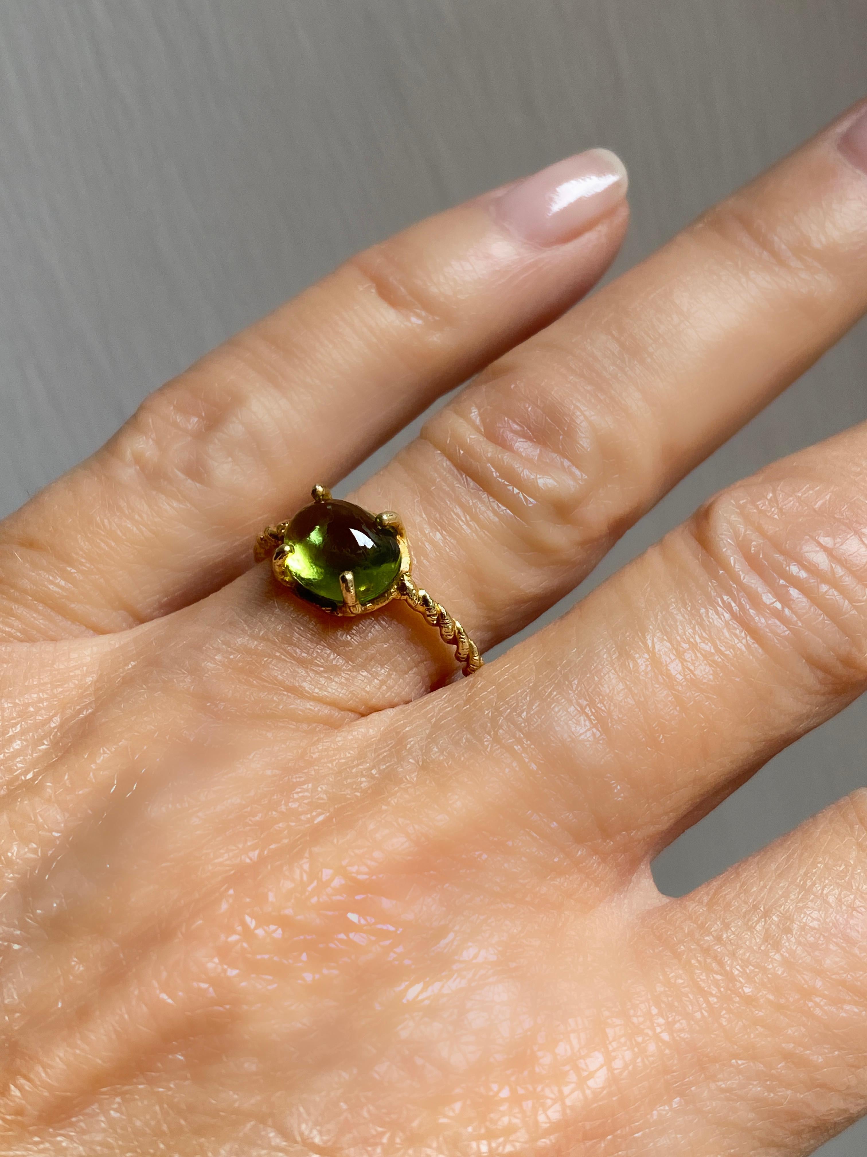 Introducing Rossella Ugolini's 18K Yellow Gold Delicate and Unique Ring, an exquisite blend of artistry and Nature designed to captivate green and nature enthusiasts.
This ring draws inspiration from Nature, featuring a handmade frame that mimics