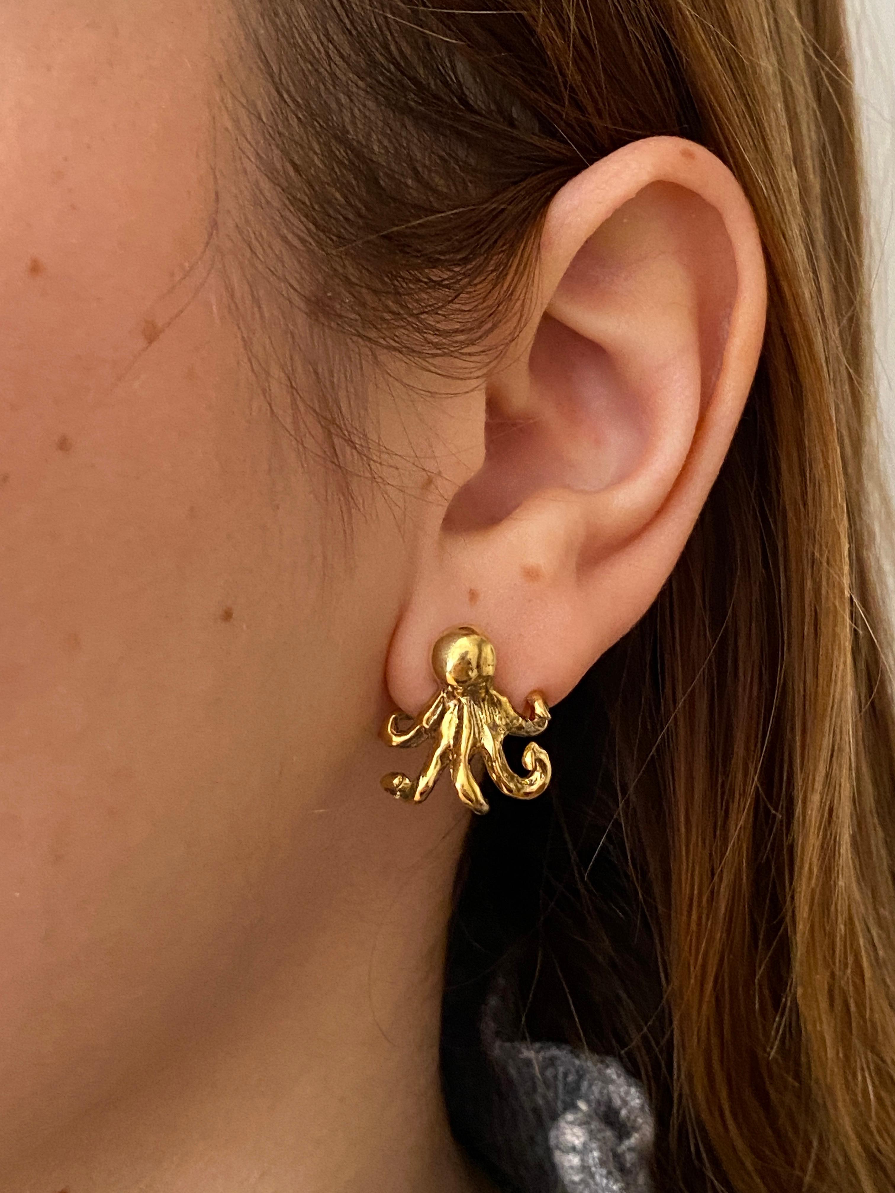 Introducing Rossella Ugolini's enchanting 18K Yellow Gold stud earrings, meticulously handcrafted in Italy. These captivating earrings feature an Octopus shape, making them a delightful choice for Nature and Sea enthusiasts.

Crafted with the unique