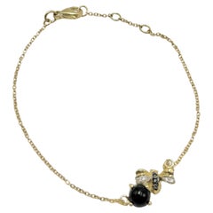 Bracelet chaîne abeille en or jaune 18k et diamants blancs Onyx rond