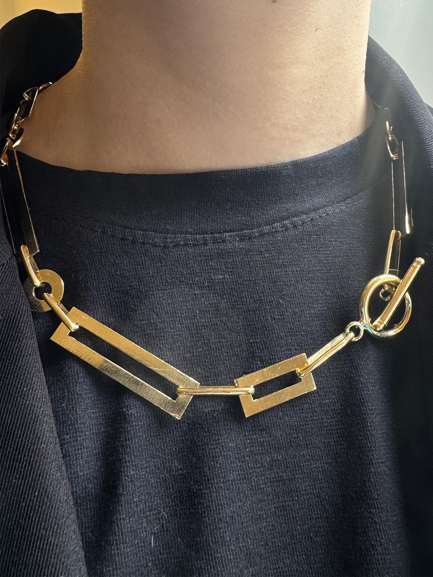 Rossella Ugolini 24k Yellow Gold-Plated Chain Link  Lariat-Style Necklace
Length: 21,65 inches (55 cm)
This lariat-style handcrafted necklace by Rossella Ugolini offers a bold yet refined expression of modern design. Made in Italy, it features a