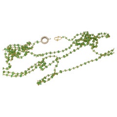 Rossella Ugolini, collier en or jaune 18 carats, perles d
émeraudes de 50 carats et diamants blancs