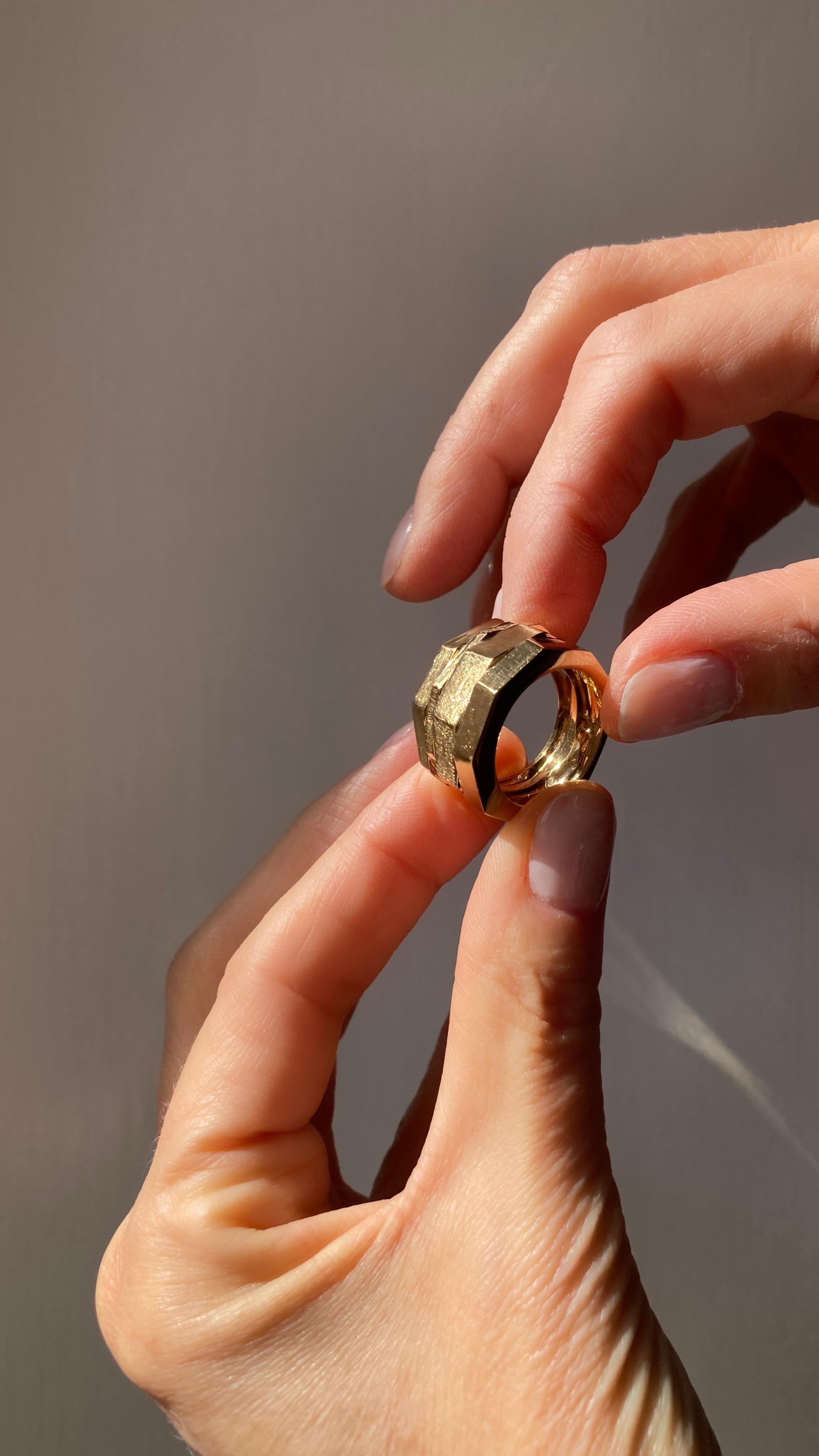 Rossella Ugolini's men's band ring, crafted in 18k yellow gold, is a striking piece from the Castle of Italy Collection. 
Weight: 20 gr Height : 1.5 cm 
This design draws inspiration from the robust stone structures of ancient fortresses. The 18K