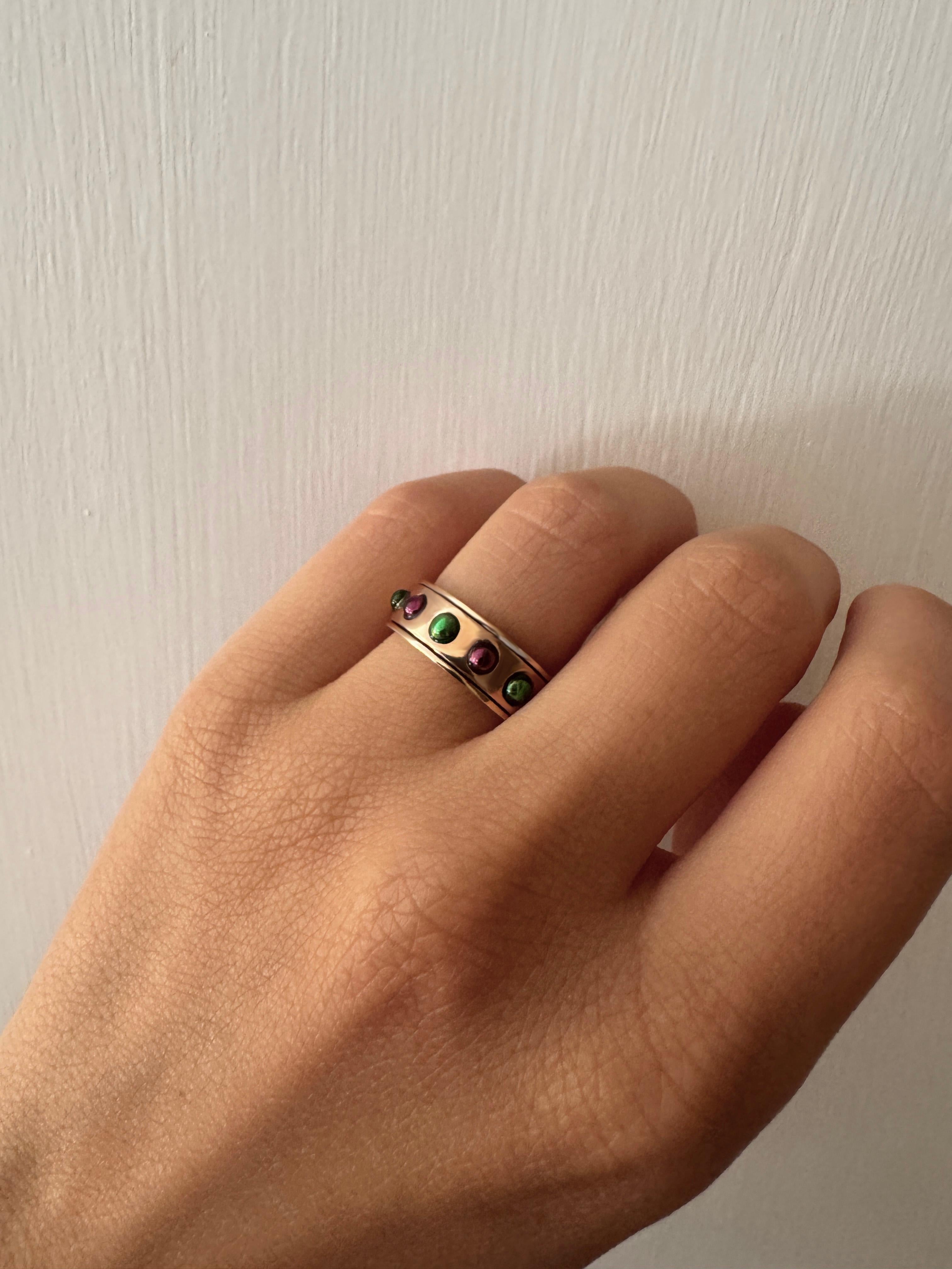 Bague à anneau rotatif en or rose 