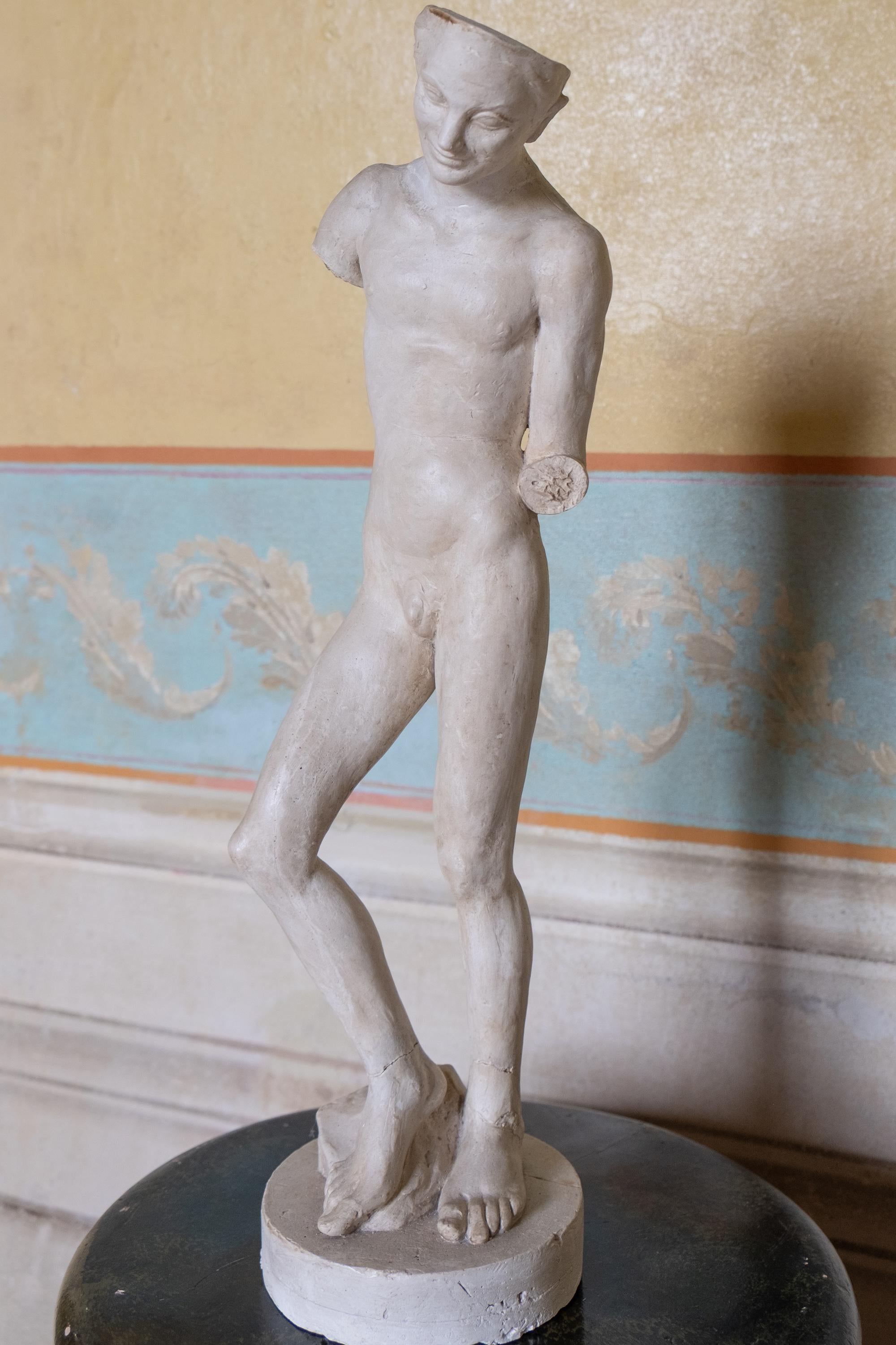 Dancing male figure, terracotta sculpture, 1930s-40s, Giorgio Rossi (1894–1981).

Terracotta modeled by hand by the artist. Unique piece. Dimensions: Height 45 cm.

The choice of terracotta as a material, is part of the Tuscan artistic tradition