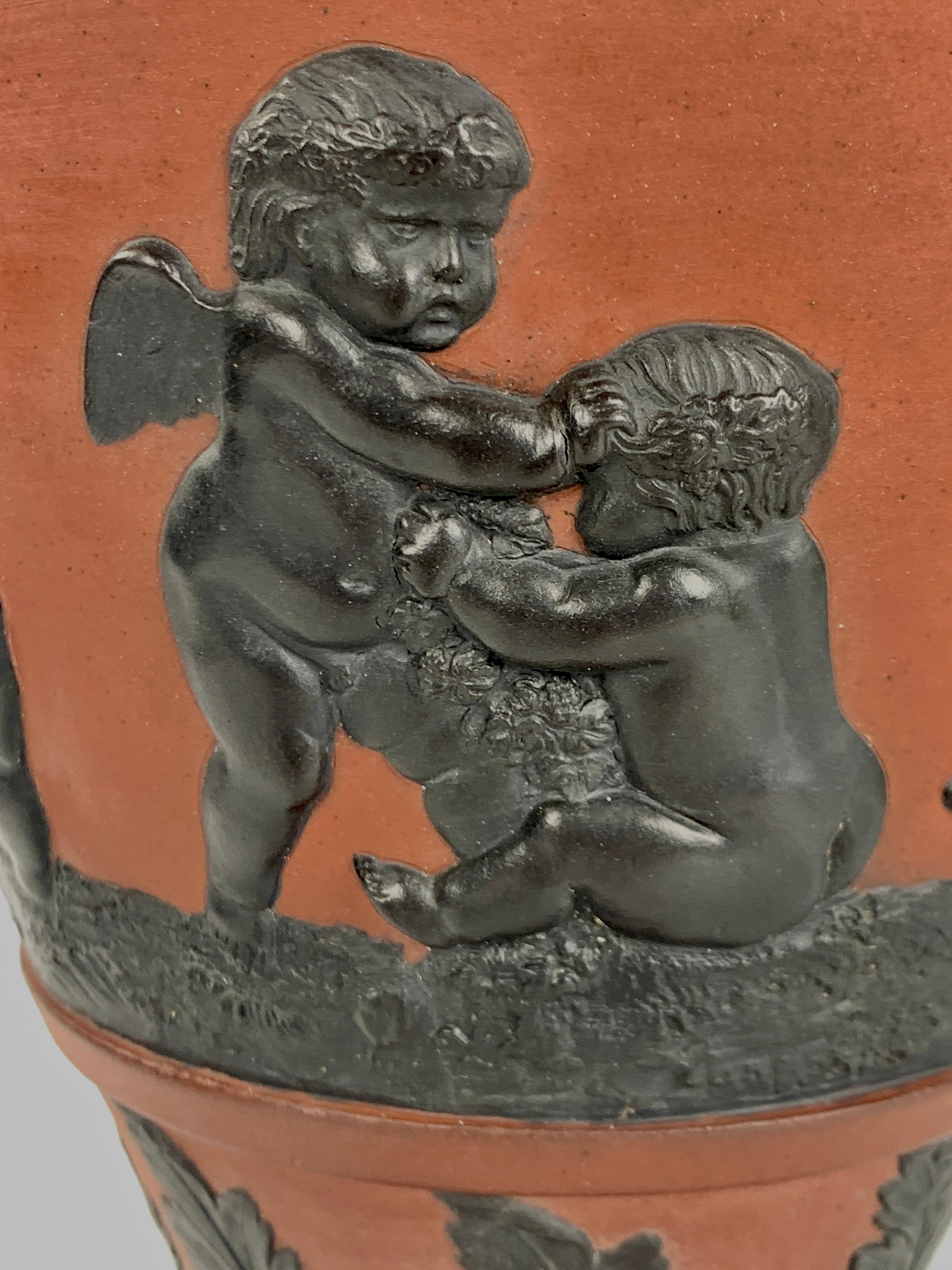 Molded Rosso Antico and Black Basalt Vase Made Circa 1815 with Neoclassical Decoration