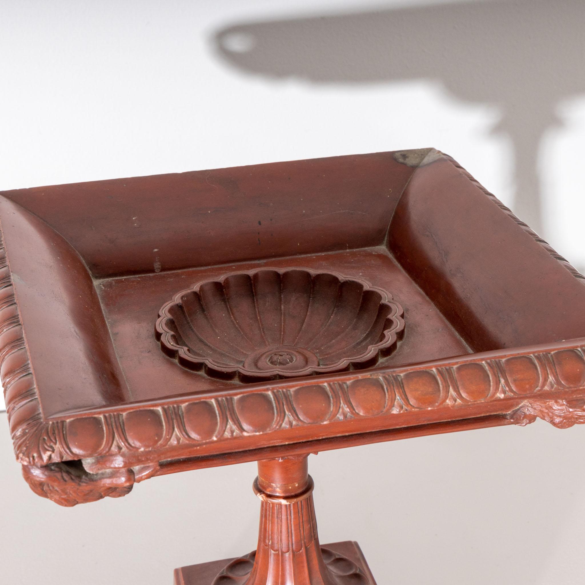 Large Italian tazza in rosso antico with swan decorations on the corners and square bowl, godron wall and fluted shaft on a square base. Based on the 1787 Tazza in rosso antico by Francesco Antonio Franzoni in the Vatican Museums.