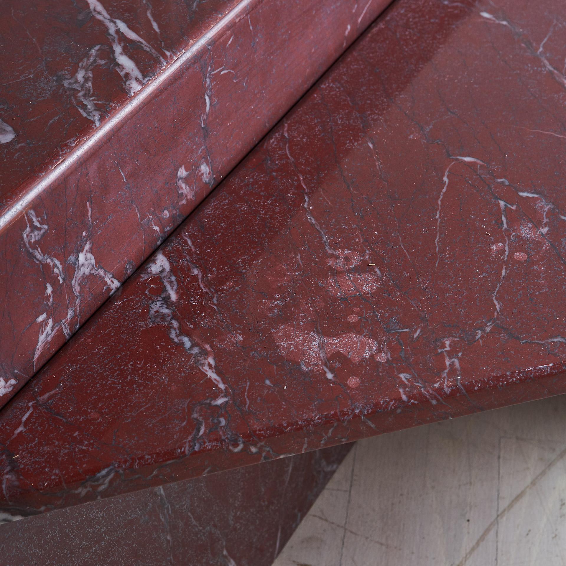 A two-tiered marble coffee table featuring a beautiful Rosso Francia (French Red) Marble. Two separate pieces have varying heights. Sourced in Europe. 

Dimensions: 14” height and 18