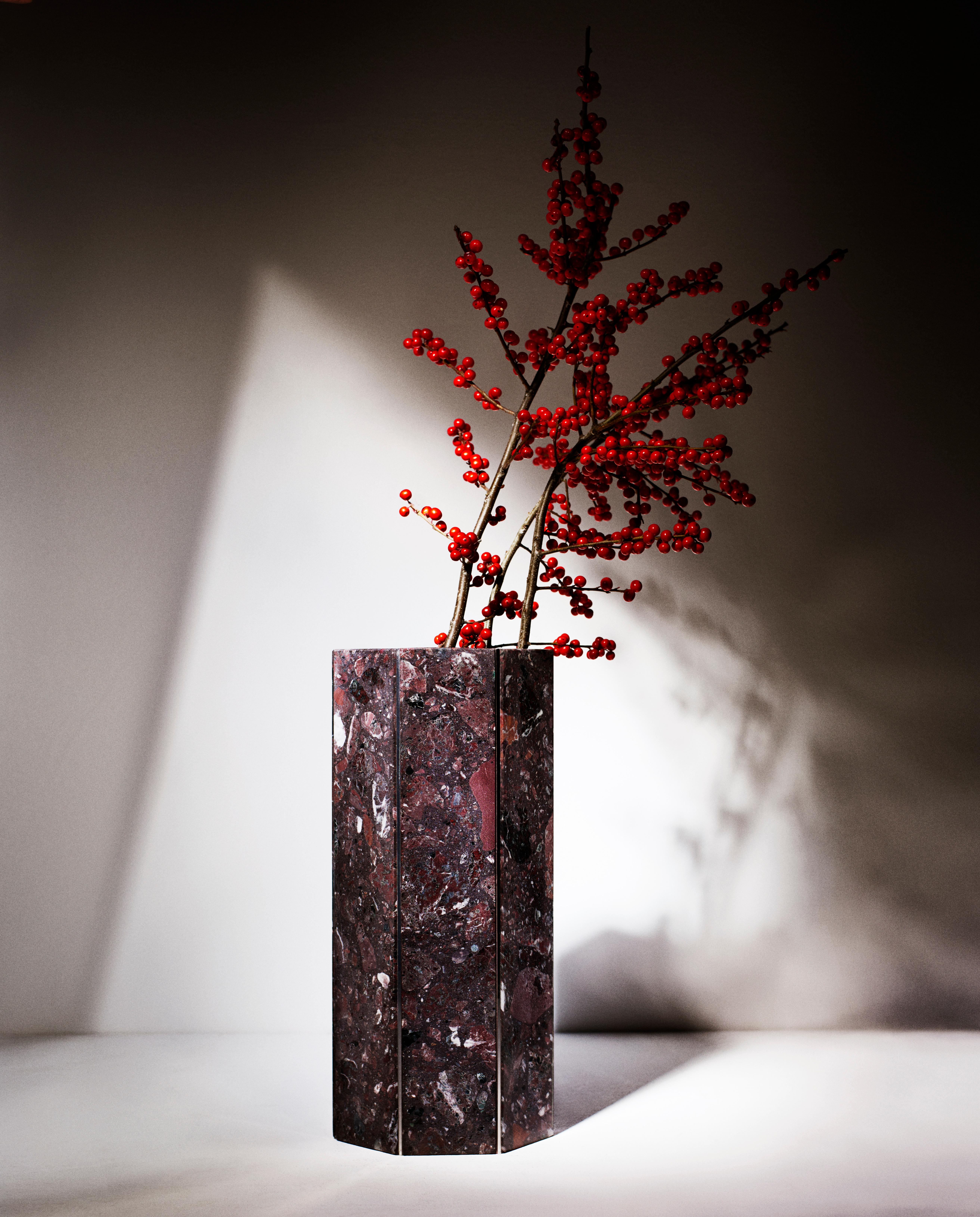 Rosso Levanto Terrazzo Heptagonal Narcissus 2017 vase by Tino Seubert
Dimensions: Ø18 x H 40 cm.
Materials: Rosso Levanto terrazzo marble, polished stainless steel.
Also available in Rosa Perlino marble.  

Tino Seubert
When he first made his