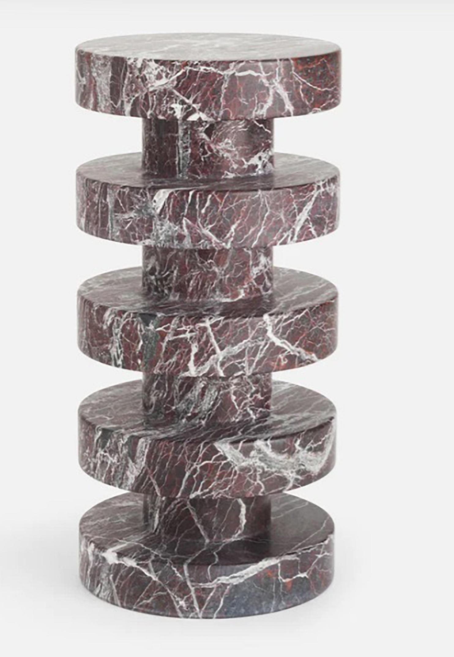 Embark on a journey of lavish refinement with the Rosso Marble Side Table, a true testament to the epitome of luxury. Meticulously crafted from solid Rosso Levanto marble, sourced exclusively from the revered quarries of Italy, this side table