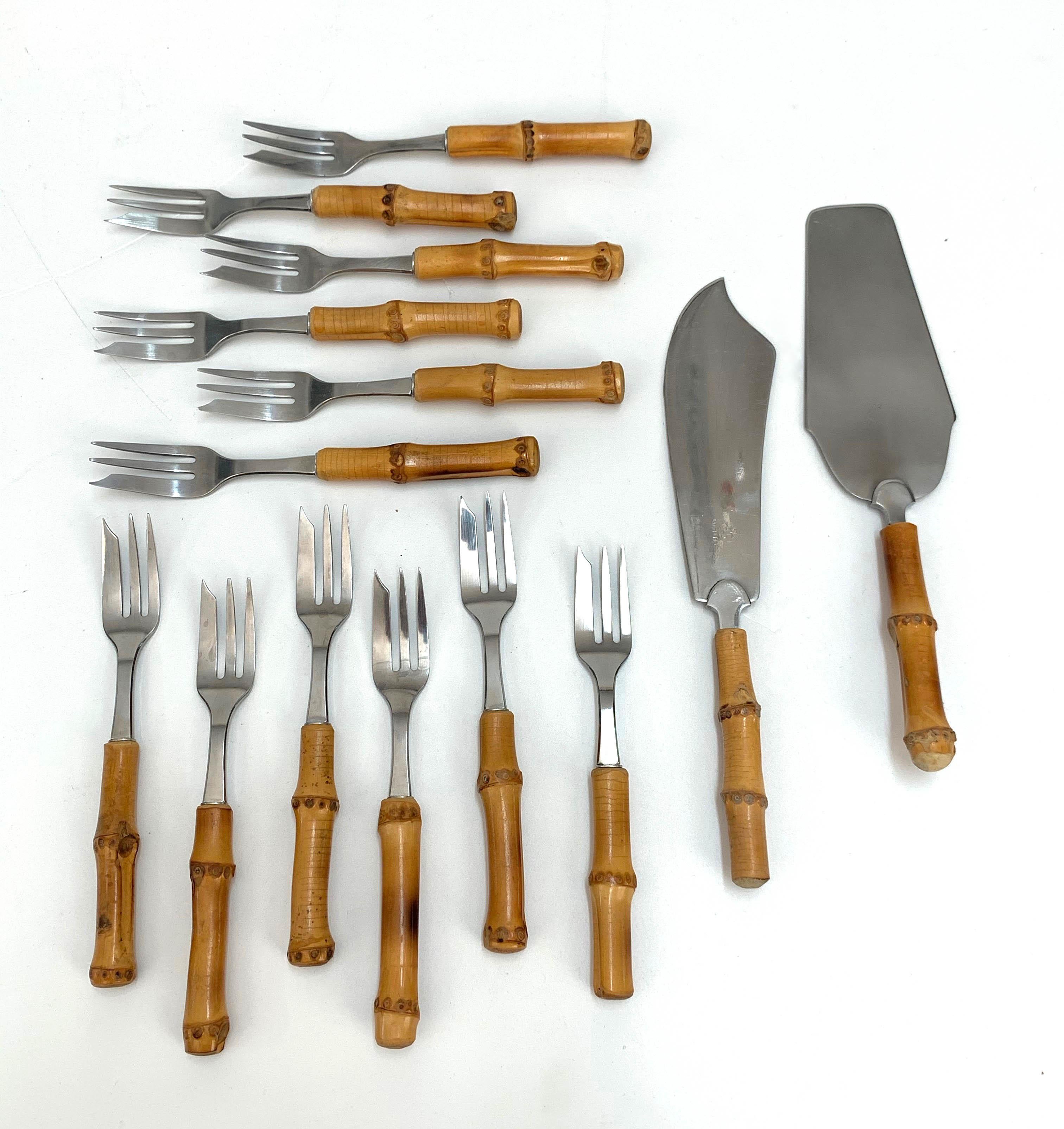 Amazing midcentury 12 people bamboo and steel dessert cutlery set. This set was designed and produced by Rostfrei in Italy during 1960s. 

These pieces are unique because of the bamboo handle and the remarkable quality of the iron. The set comes