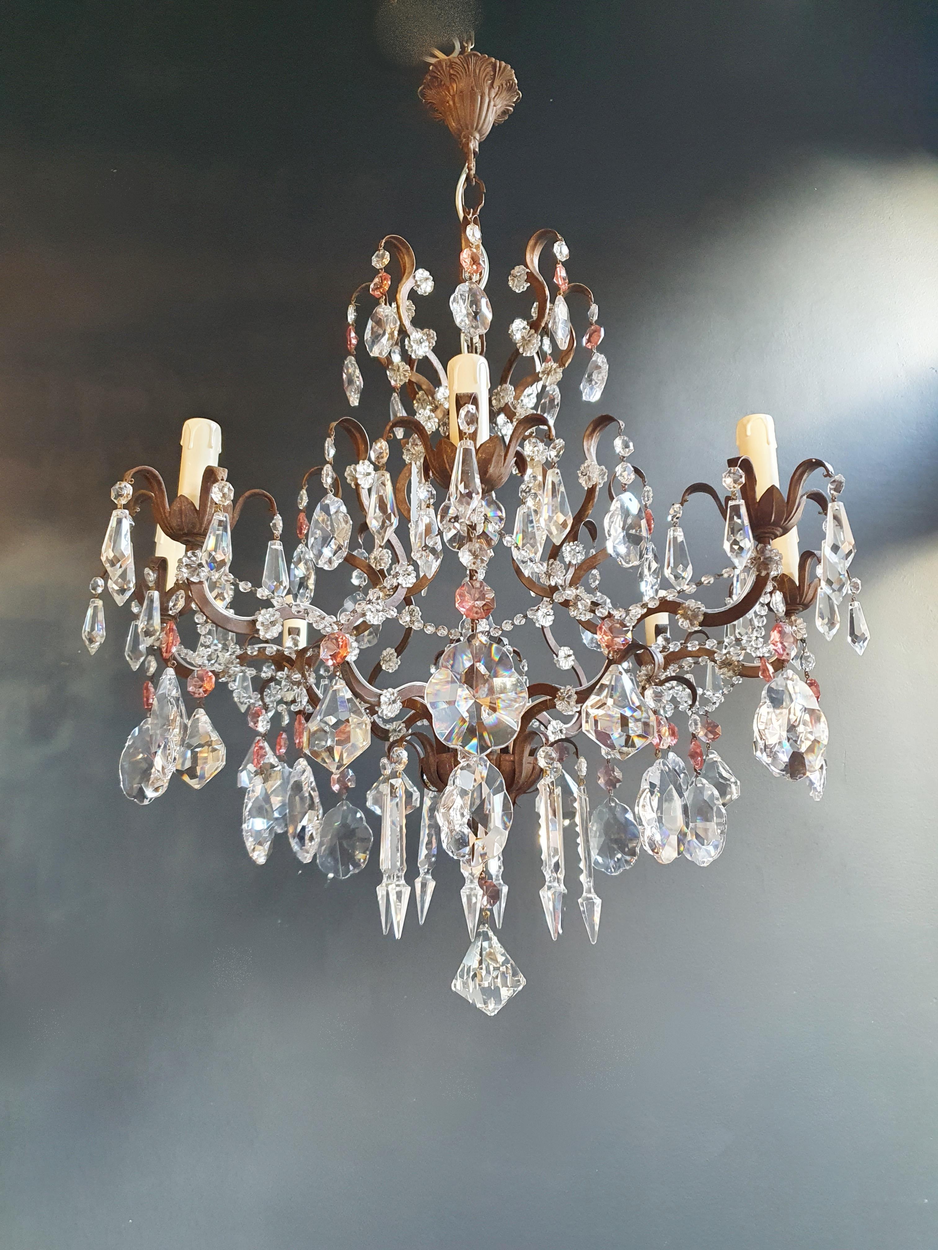 Rosy crystal antique chandelier ceiling florentiner lustre Art Nouveau

Measures: Total height 99 cm, height without chain 73 cm, diameter 71 cm. Weight (approximately): 15kg.

Number of lights: 8-light bulb sockets: E14 material: Brass, cut