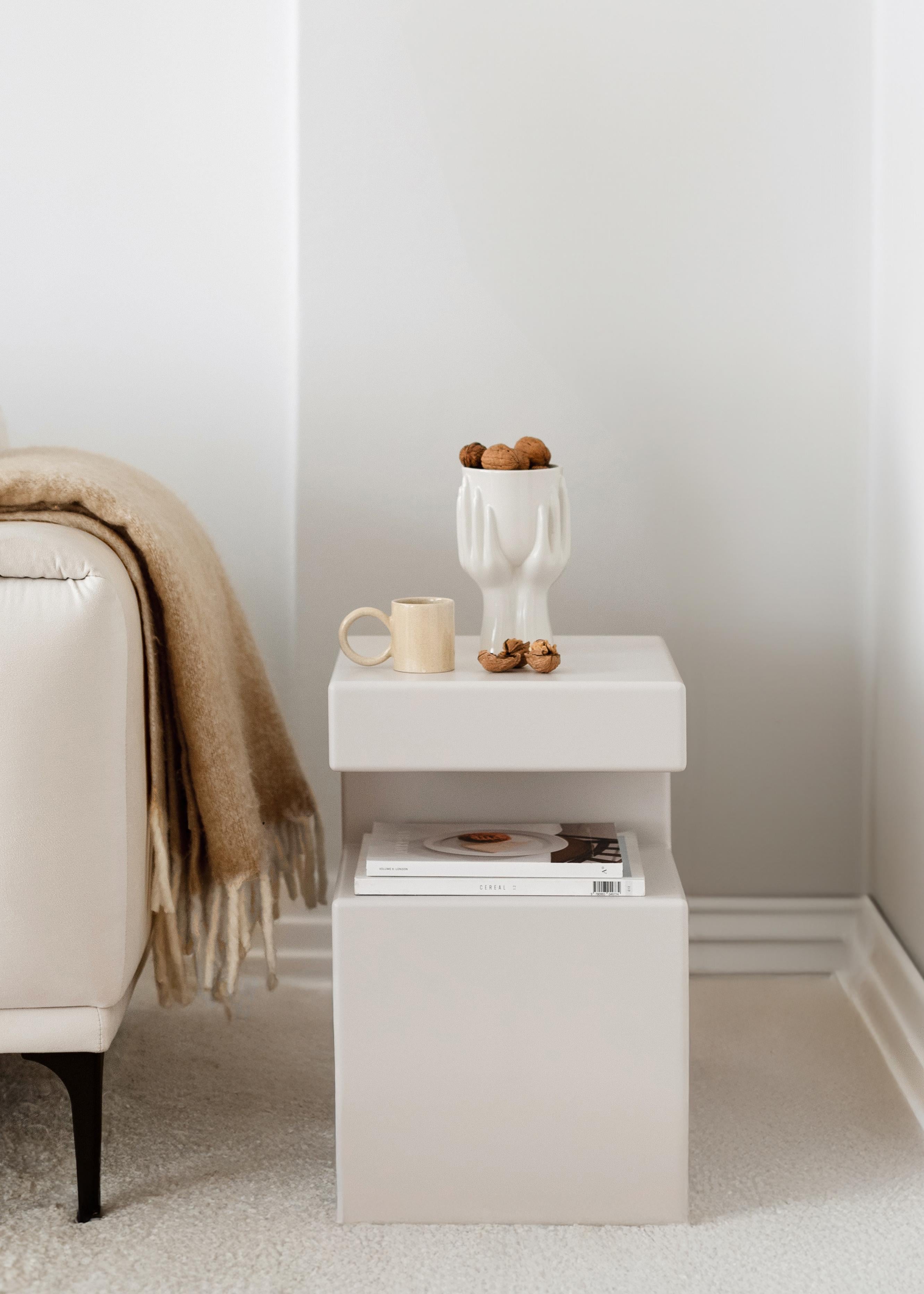 Rota stands out with its unique functional design and can be turned and used in any direction according to usage preference. It can be used both as a nightstand and side table. 

The chamber in its body gives the product a different function. It is