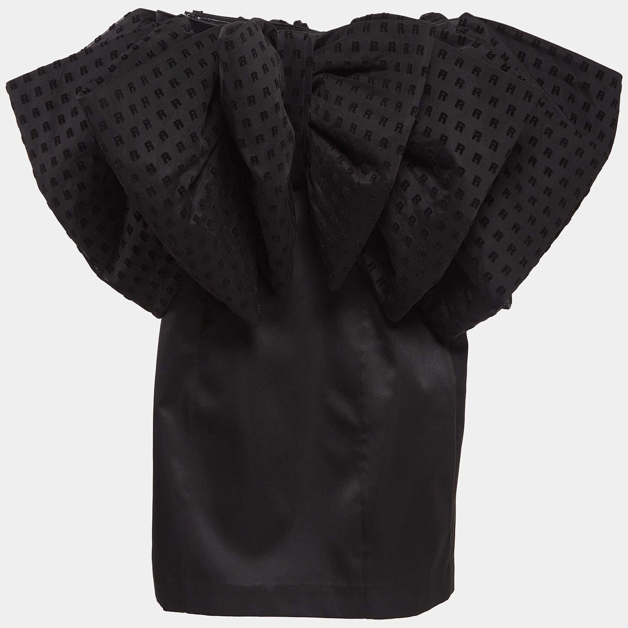 This designer dress is a chic and stylish garment that exudes elegance and sophistication. With its sleek design flattering silhouette and high quality craftsmanship this dress is perfect for any special occasion or evening event ensuring you stand