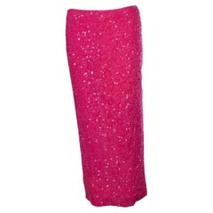 Rotate, pink sequinned skirt with back slit