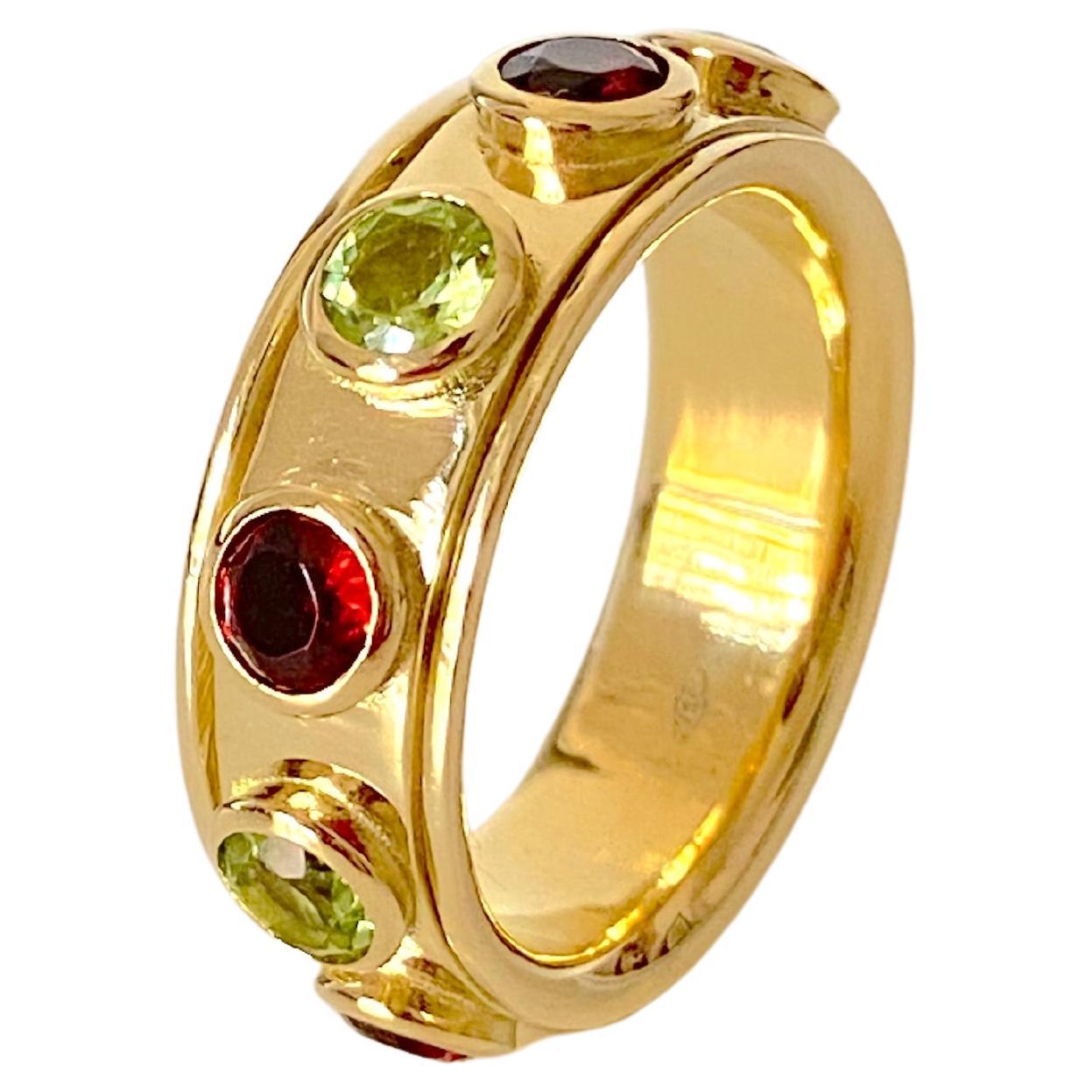 Rotating Band Ring 18 Karats Yellow Gold Garnet Peridot Design Ring For Sale