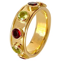 Rotating Band Ring 18 Karats Yellow Gold Garnet Peridot Design Ring