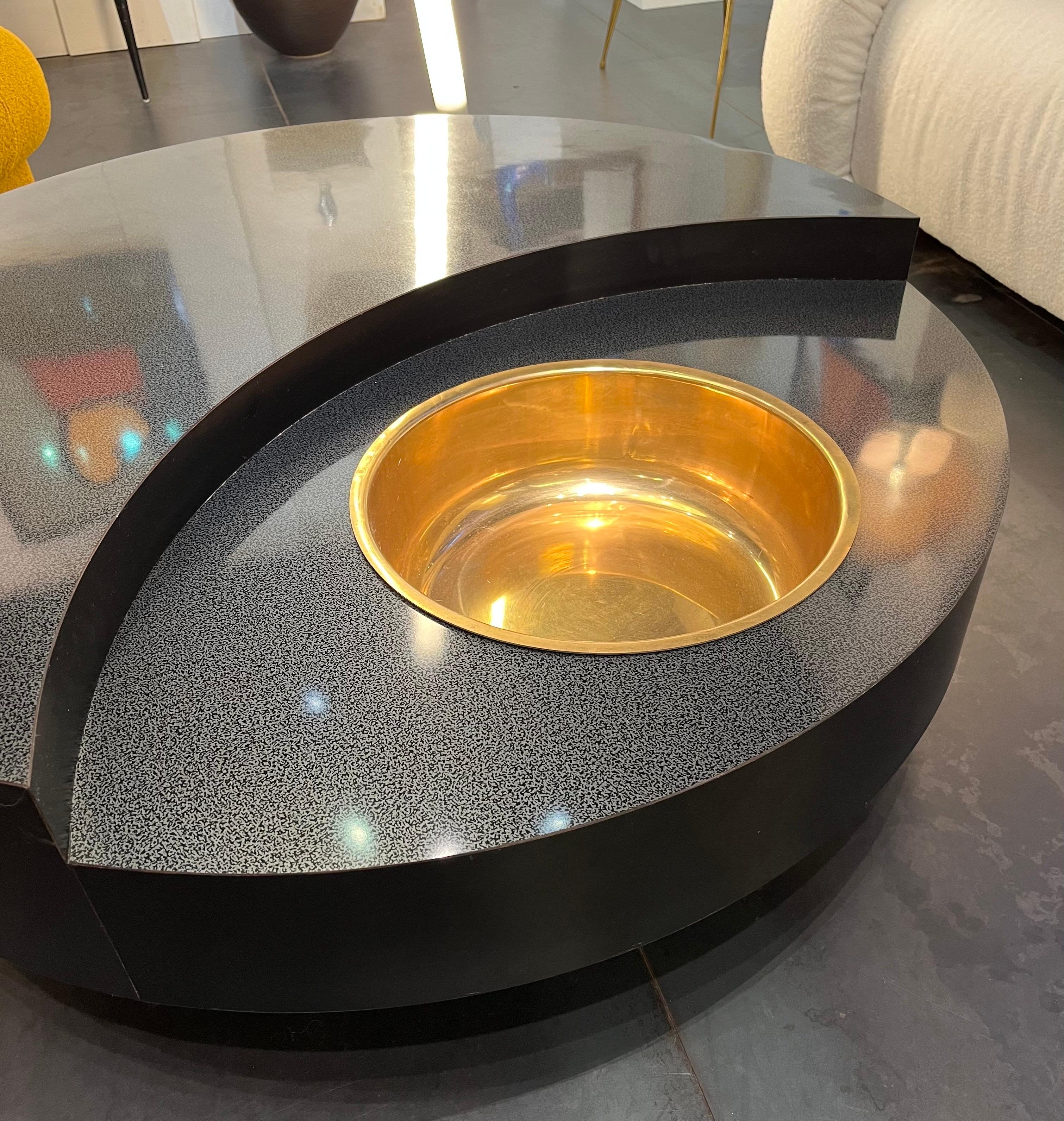 Rare rotating coffee table in lacquered wood and gilt brass by Willy Rizzo, France circa 1970’s.
Special order.