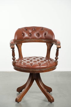 Rotating English style Chesterfield office chair in brown cow leather