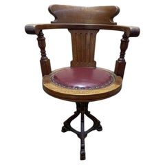 Rotating mahogany ship's desk chair