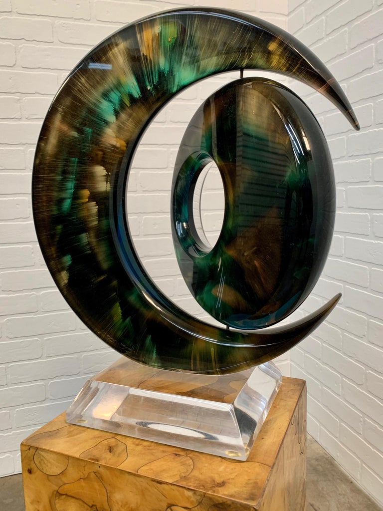 Rotating Sphere within a Crescent Lucite Sculpture by Shlomi Haziza at