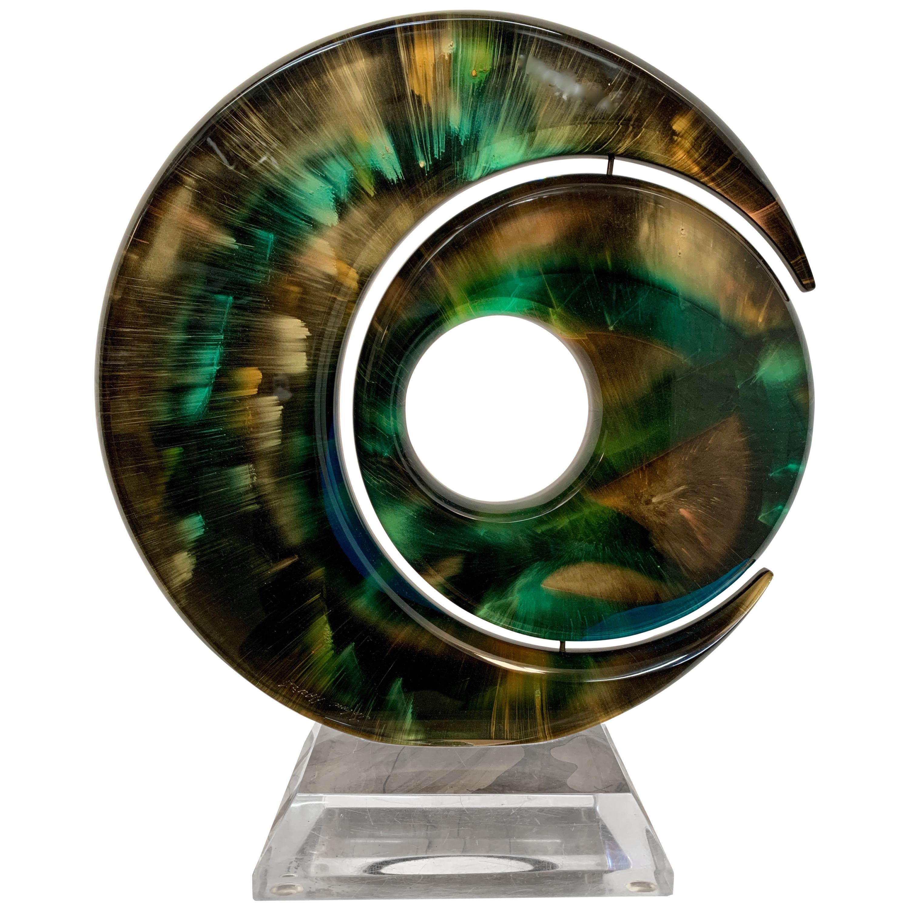 Rotating Sphere within a Crescent Lucite Sculpture by Shlomi Haziza