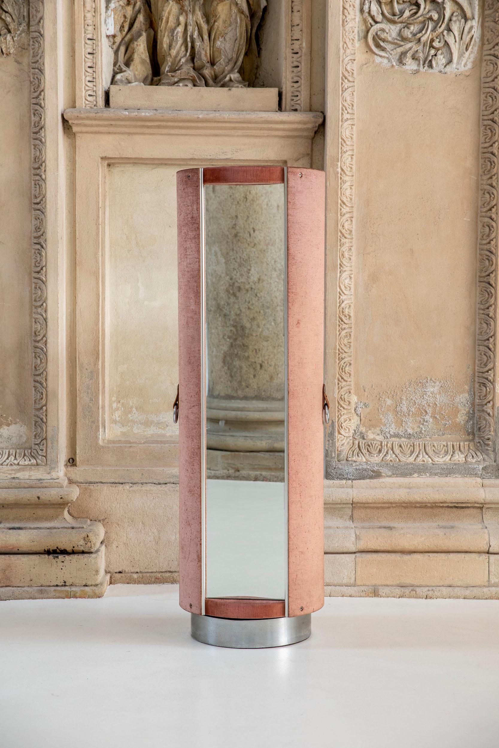 Rare mirrored rotating wardrobe by Guido Faleschini for Mariani, Italy 1970.
Original pink velvet, leather tabs and original full length mirror on a chrome base. 
Large compartment inside for old coats or dresses. 
 
