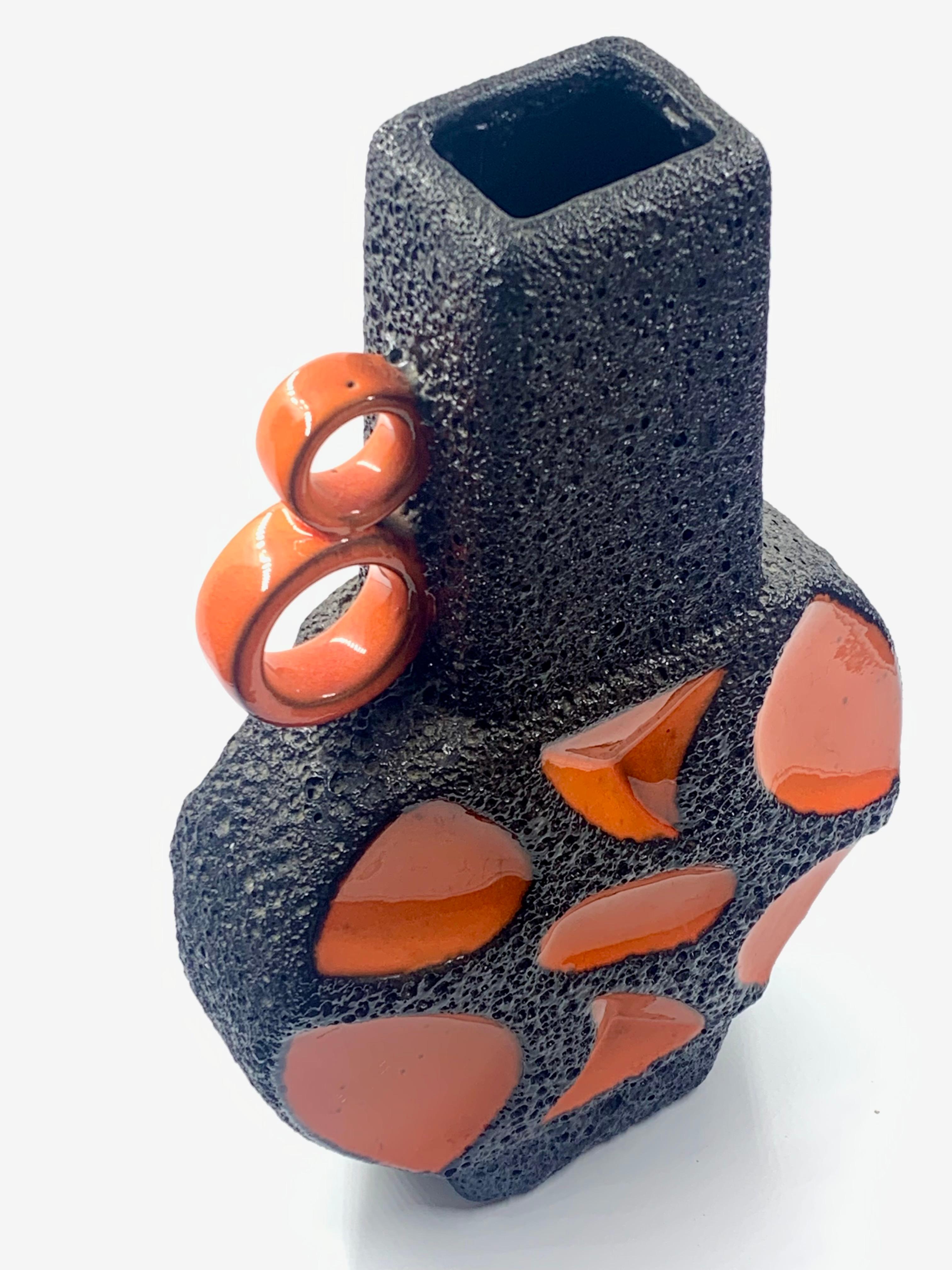 Molded Roth Keramik orange and black lava glaze, 40cm, West Germany, c. 1970. For Sale