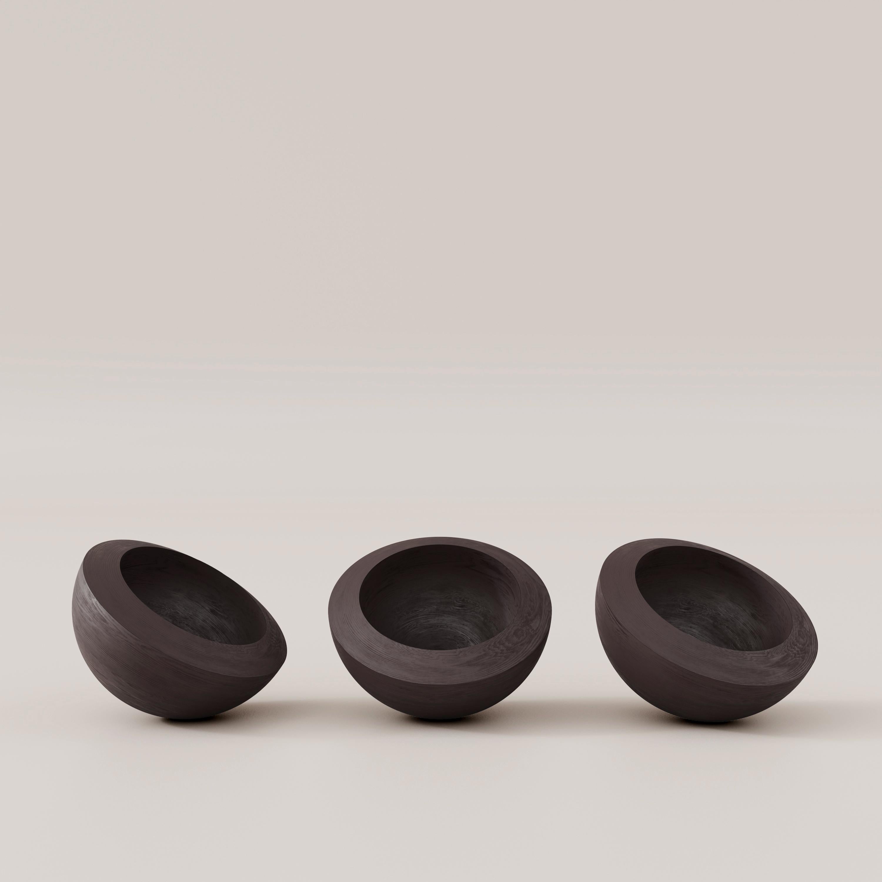 Rotola Wood Tabletop by Francesco Zonca
Numbered series signed
Dimensions: D 32 x W 32 x H 18 cm
Materials: Wood, patina.

An ornament empty pockets that follows you.
It rotates, it rolls.

“Geometrie Collection” is born from the strength of