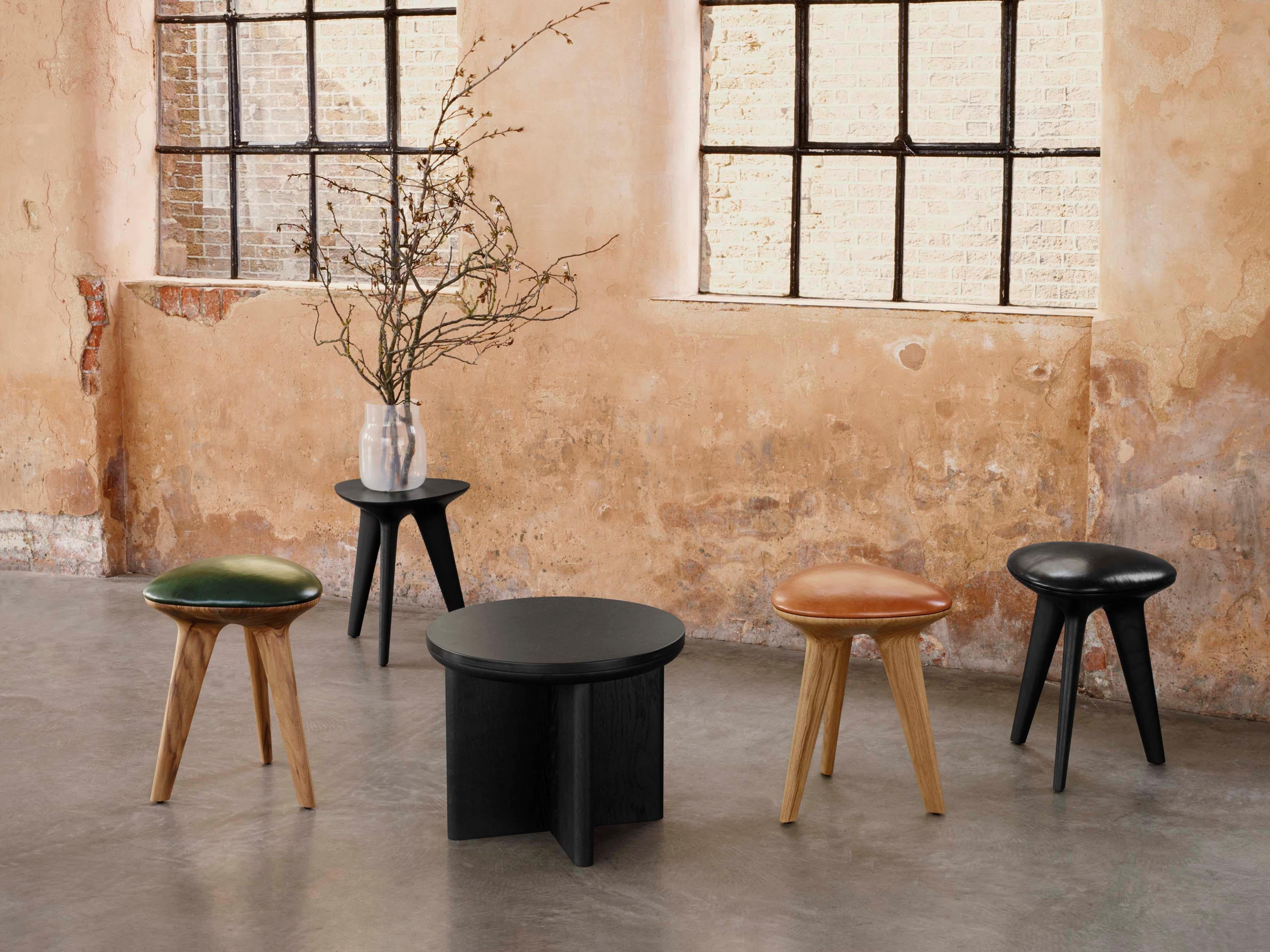 Inspired by the Reuleaux rotating triangle, the form of the Rotor stool is based on the intersection of three circles. The CNC-cut organic shape celebrates ‘the curve of constant width'. Available as a comfortable stool in oak or ebonised oak with