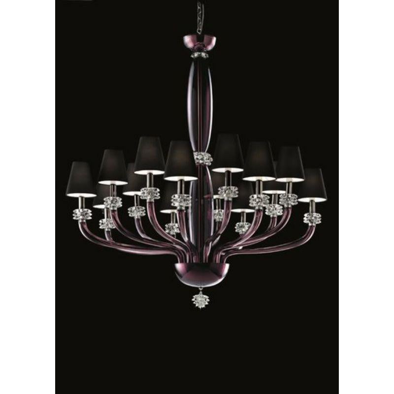 Arms curving upward, an oval trunk, crystal spools created by hand using a Barovier&Toso patent: “rostrato”. Precious objects of extraordinary elegance and refinement, capable of satisfying the most demanding and sophisticated customers.
