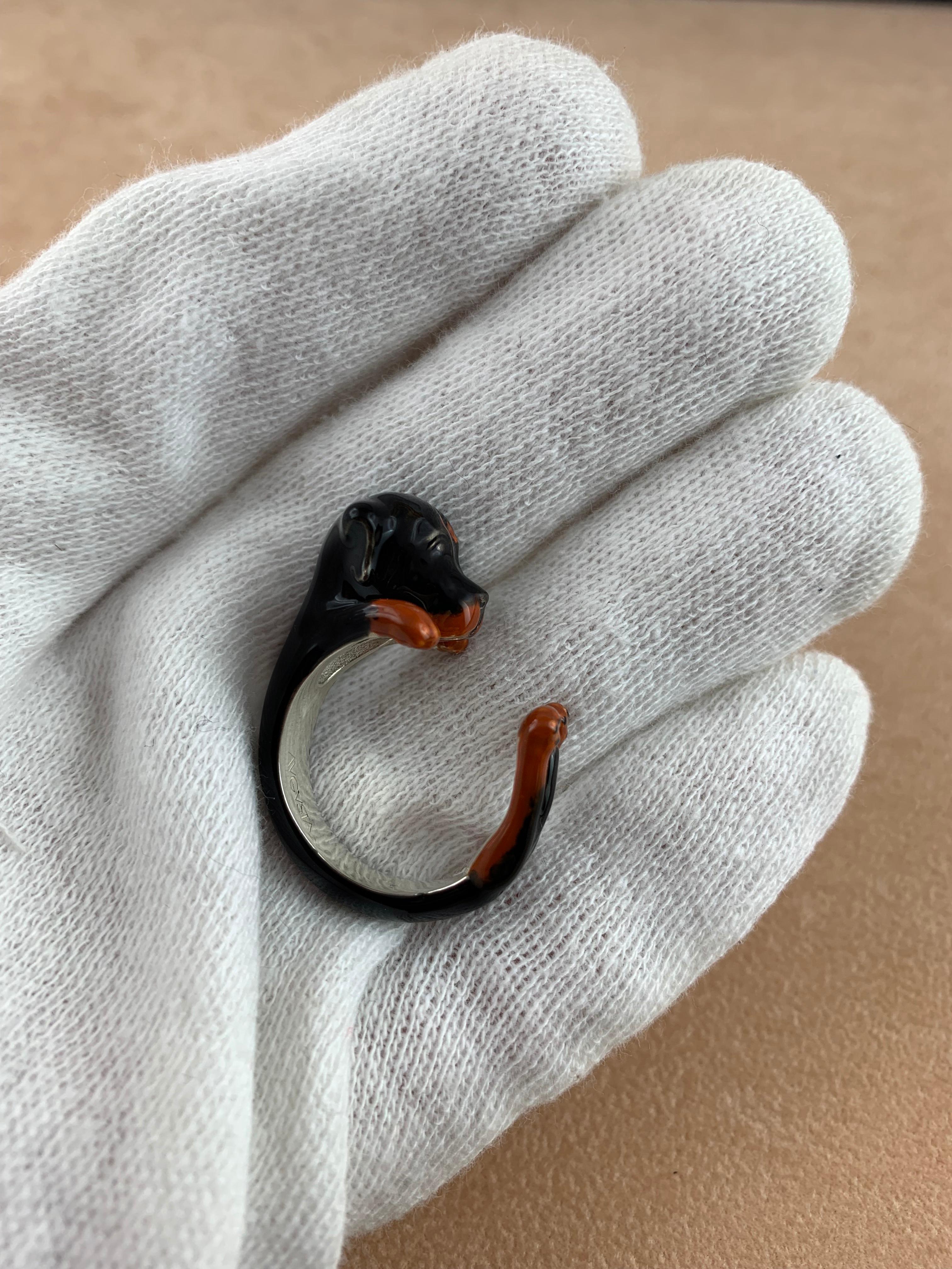 Ring made in sterling silver 925 featuring a Rottweiler, thanks to amazing hand enamel life-like features is vividly rendered.   

The AVGVSTA Dog ring is hand made and 100% customizable.  
We offer free engraving-perfect for dog's name or the owner