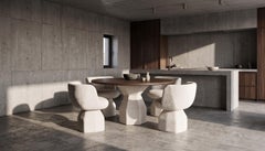 Rotunda Dining Table Featuring Upholstered Pedestal Base