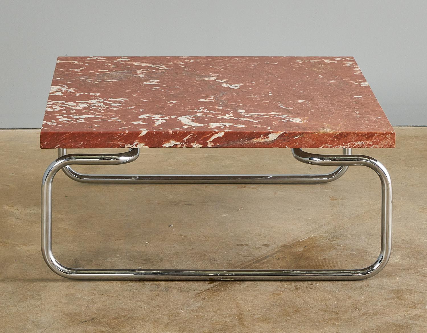 Gorgeous Rouge Marble and Chrome Coffee Table by Michael Mccarthy for Cassina. Marble retains it's original label from the stone supplier, a charming detail on this very hefty piece of history. Very good, near excellent, vintage condition.  