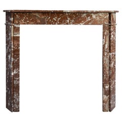 Used Rouge marble fireplace mantel 19th Century