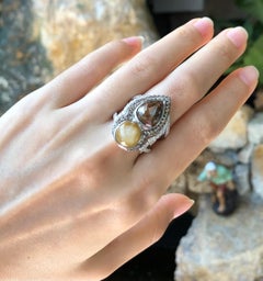 Rough Diamond, Yellow Star Sapphire and Diamond Ring Set in 18 Karat White Gold