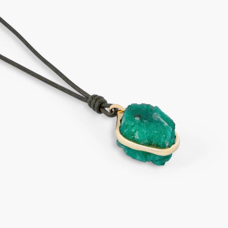 Rough Emerald (71.05ct) Pendant in 18k Yellow Gold

A magnificent rough emerald, sourced from Colombia, is placed within a melted bezel setting, allowing the raw and organic beauty of the stone to be admired from nearly all angles. The 18k yellow
