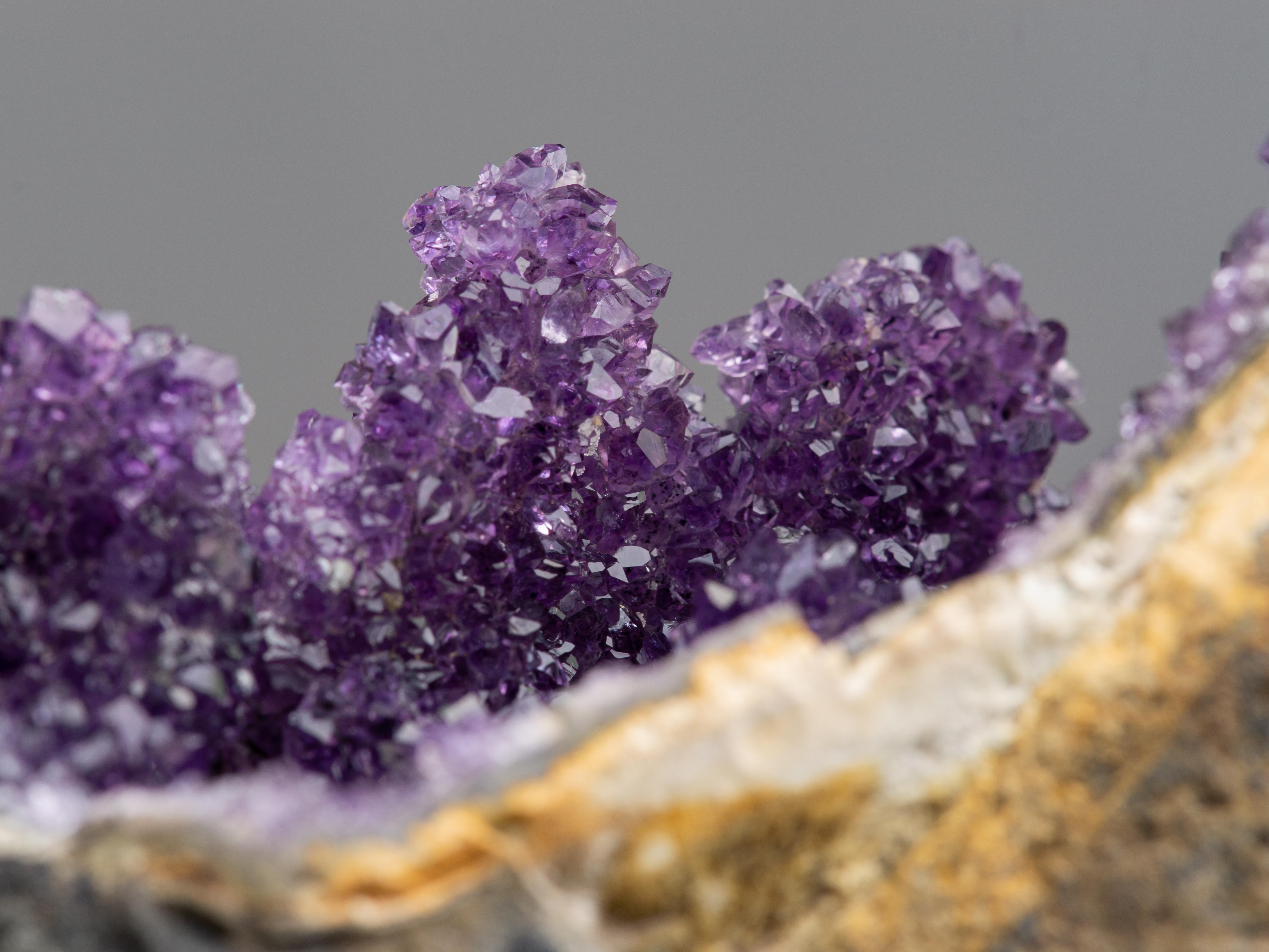 Rough geode section with contrasting amethyst For Sale 11