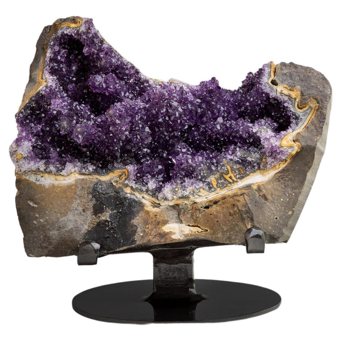 Rough geode section with contrasting amethyst For Sale