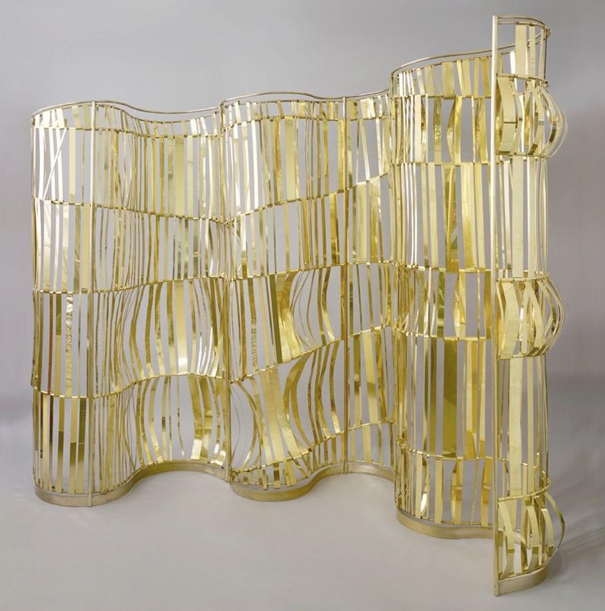 TAHER CHEMIRIK ROUGH SEA  2012  SCREEN – ROOM DIVIDER BRASS 
Dimensions: H 90.5 X L 118 X W 19.5 INCHES

About the Artist
Since 2012, jewelry artist Taher Chemirik has been designing furniture and lights for Galerie BSL that are like true jewels for
