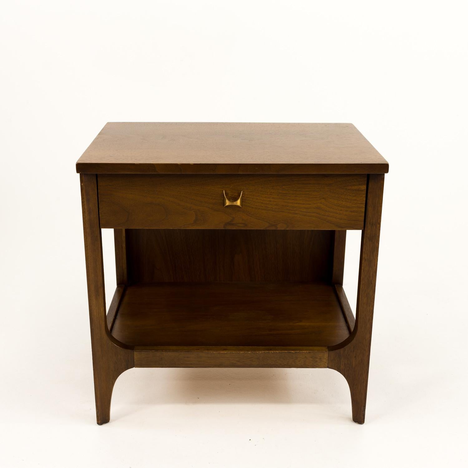 Restored Broyhill Brasilia Mid Century Brutalist Walnut Nightstands - Pair 

Each nightstand measures 22.25 wide x 15 deep x 22.25 high 

All pieces of furniture can be had in what we call Restored Vintage Condition. This means the piece is
